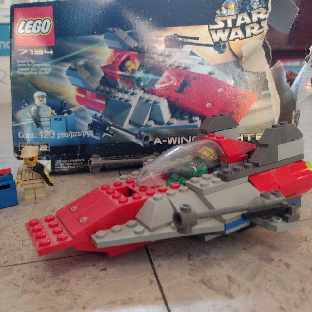 Like new Lego Star Wars, A Wing Fighter, retired, w original box & instructions